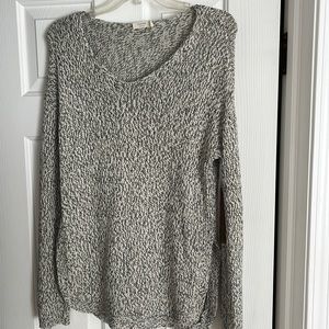 Black and white sweater with elbow patches